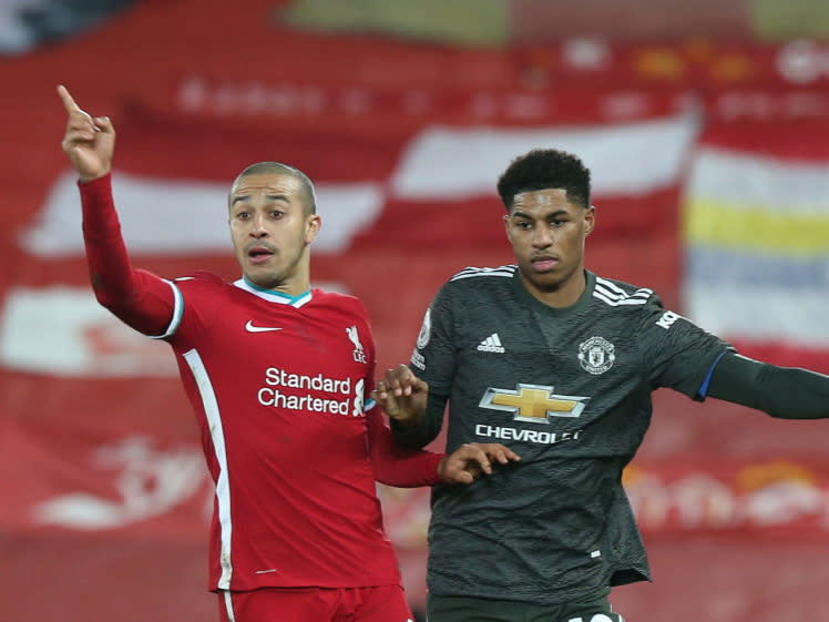 Marcus Rashford in action with Thiago Alcantara (Getty)