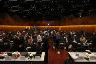 Lawyers prepare before the start of a hearing over the VW diesel emissions cheating scandal, in Braunschweig