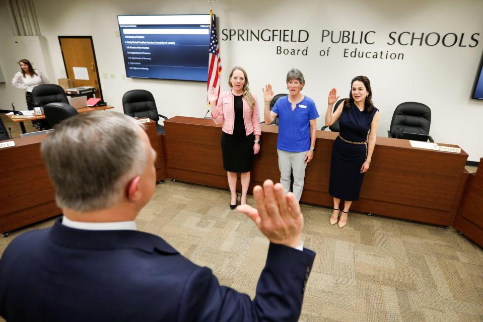Danielle Kincaid, Susan Provance, and Maryam Mohammadkhani are sworn in to the Springfield Public Schools Board of Education by Greene County Clerk Shane Schoeller on Tuesday, April 9, 2024.