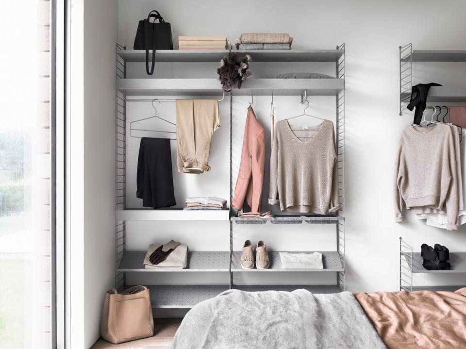 Smart storage with the metal string system wardrobe (String Furniture)