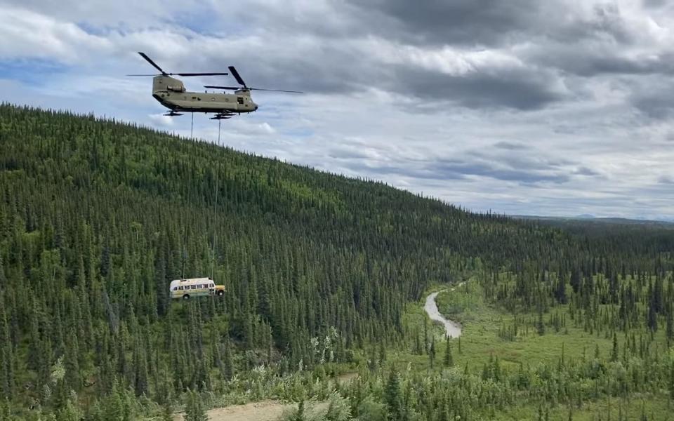 The bus was flown away by helicopter over the Alaskan backcountry - ALASKA NATIONAL GUARD HANDOUT/EPA-EFE/Shutterstock/Shutterstock