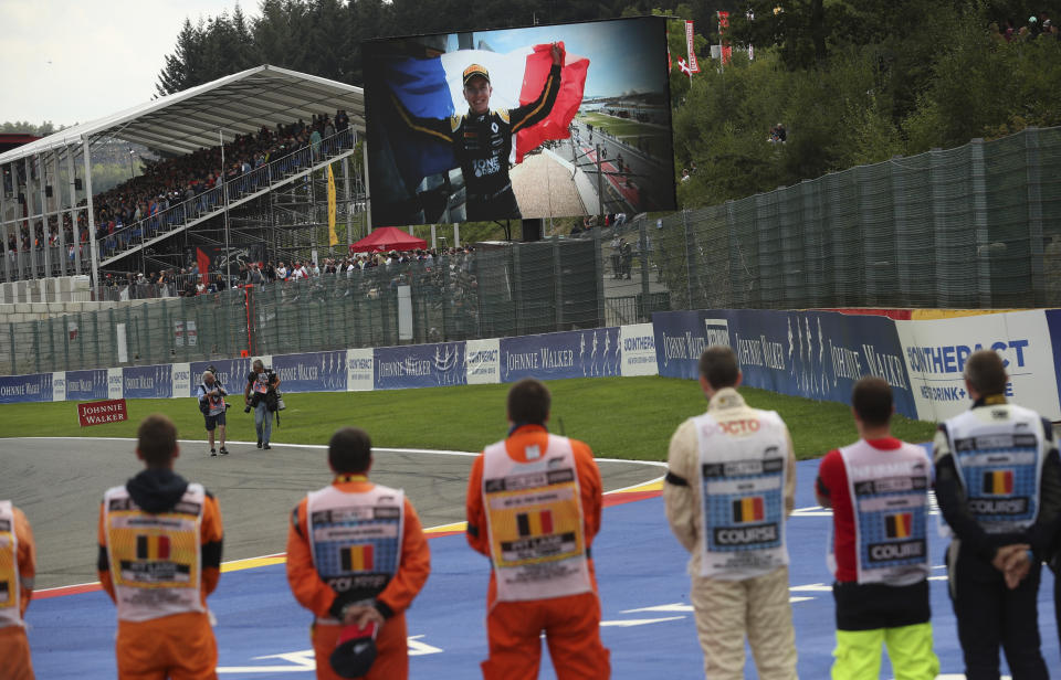 A large screen television shows Formula 2 driver Anthoine Hubert prior to the start of the Belgian Formula One Grand Prix in Spa-Francorchamps, Belgium, Sunday, Sept. 1, 2019. The 22-year-old Hubert died Saturday following an estimated 160 mph (257 kph) collision on Lap 2 at the high-speed Spa-Francorchamps track, which earlier Saturday saw qualifying for Sunday's Formula One race. (AP Photo/Francisco Seco)