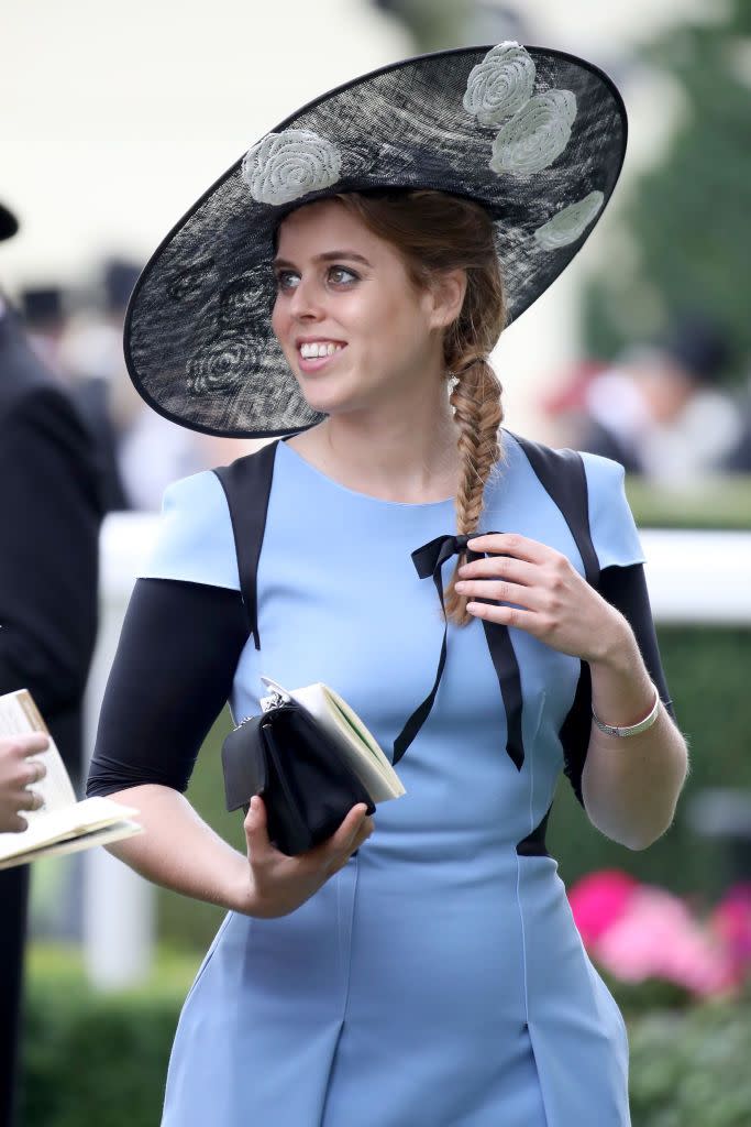 <p>Princess Beatrice of York looked stylish in this pale blue and navy <a href="https://www.amandawakeley.com/us/" rel="nofollow noopener" target="_blank" data-ylk="slk:Amanda Wakeley;elm:context_link;itc:0;sec:content-canvas" class="link ">Amanda Wakeley</a> dress, which she accessorized with a Chanel clutch.</p>