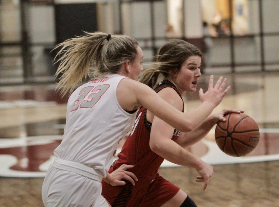 Ballinger senior Jenna Battle drives against Holliday on Dec. 27. Battle helped her freshman sister, Jessa, adjust to varsity basketball.