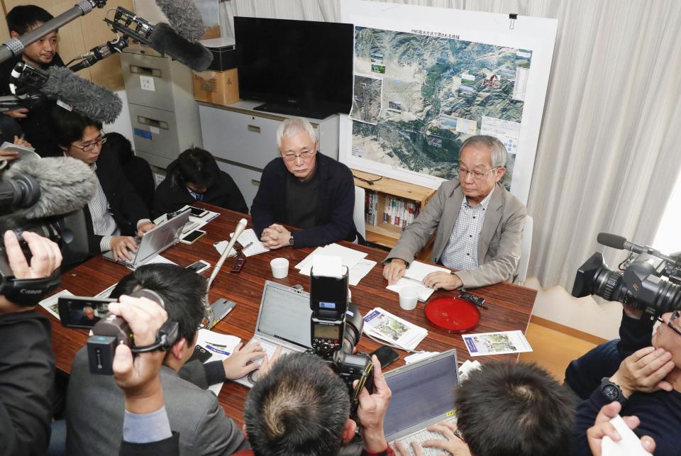 NGO members, center, of Peace Medical Services headed by Japanese doctor Tetsu Nakamura, hold a press conference in Fukuoka, western Japan after Nakamura was attacked in Afghanistan, Wednesday, Dec. 4, 2019. The Japanese physician and aid worker in eastern Afghanistan, died of his wounds after an attack Wednesday that also killed five Afghans, including the doctor’s bodyguards, the driver and a passenger, a hospital spokesman said.(Kyodo News via AP)