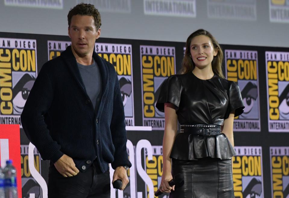 English actor Benedict Cumberbatch and US actress Elizabeth Olsen during the Marvel panel in Hall H of the Convention Center during Comic Con in San Diego, California on July 20, 2019. (Photo by Chris Delmas / AFP)        (Photo credit should read CHRIS DELMAS/AFP/Getty Images)