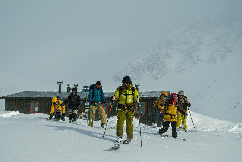 Buttard leading the charge out of the Tarfala Hut on a particularly frosty morning; (photo/Mats Drougge Photography)