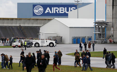 An Airbus logo is pictured as employees attend the Airbus A350-1000 maiden flight event in Colomiers near Toulouse, Southwestern France, November 24, 2016. REUTERS/Regis Duvignau