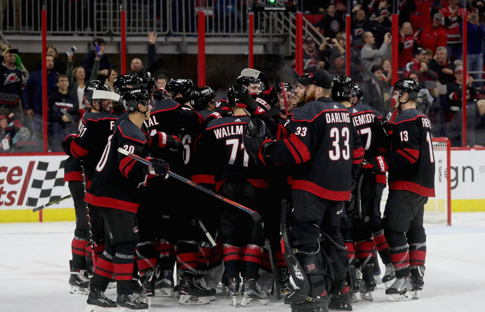 The Hurricanes’ post-win celly is nearly as fabulous as their sleek black threads. (Getty Images)