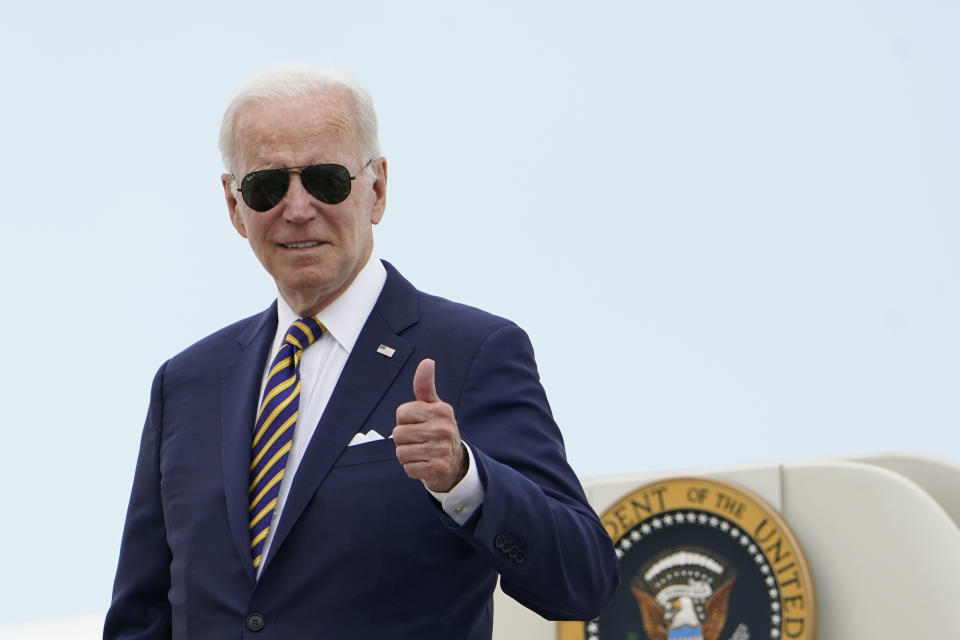 President Joe Biden gives a thumbs up as he boards Air Force One at Andrews Air Force Base, Md., Wednesday, Aug. 10, 2022. Biden is traveling to Kiawah Island, S.C., for vacation. (AP Photo/Manuel Balce Ceneta)