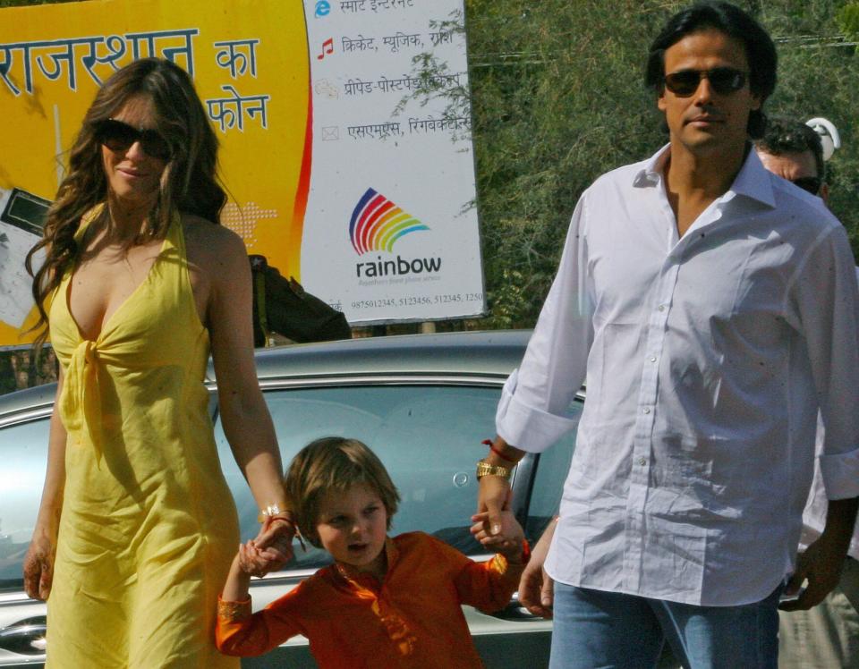 Arun Nayar and Elizabeth Hurley with her son Damian, pictured in 2008 - AFP 