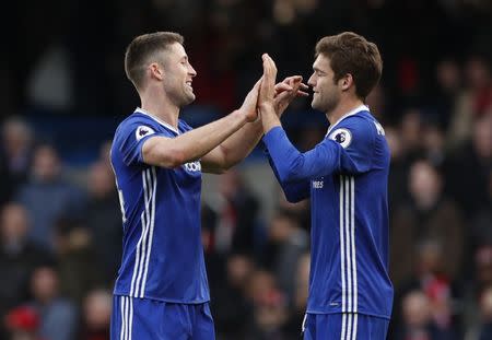 Britain Football Soccer - Chelsea v Arsenal - Premier League - Stamford Bridge - 4/2/17 Chelsea's Gary Cahill and Marcos Alonso celebrates after the game Action Images via Reuters / John Sibley Livepic