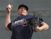 Atlanta Braves pitcher Mark Melancon throws at baseball spring training camp in North Port, Fla., Friday, Feb. 14, 2020. (Curtis Compton/Atlanta Journal-Constitution via AP)