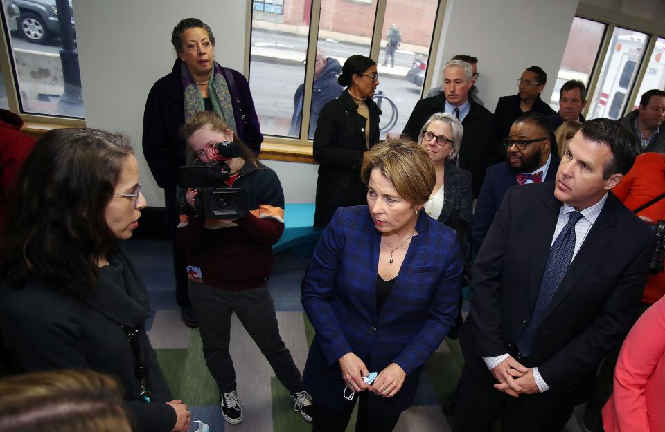 Maria Celli, Deputy CEO of the Brockton Neighborhood Health Center, left, speaks about a new pharmacy being readied to open in a few weeks at the health center to Gov. Maura Healey and Brockton Mayor Robert Sullivan on Thursday, March 2, 2023.