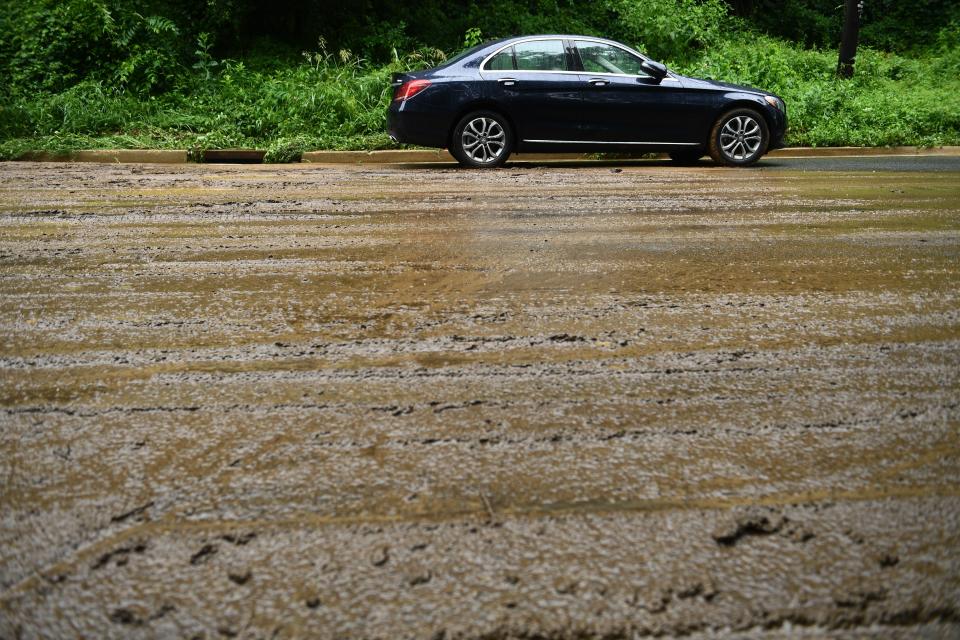 An abandoned car is left after the rain storm on Canal Road on July 8, 2019 in Washington, D.C. (Photo: Brendan Smialowski/AFP/Getty Images)