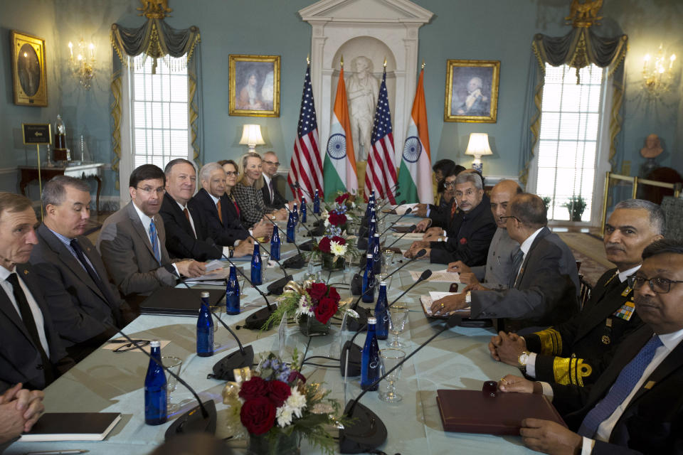 Secretary of State Mike Pompeo and Secretary of Defense Mark Esper, center left, host Indian External Affairs Minister Dr. S. Jaishankar and Defense Minister Shri Rajnath Singh, center right, during a bilateral meeting at the Department of State in Washington, Wednesday, Dec.18, 2019. (AP Photo/Jose Luis Magana)