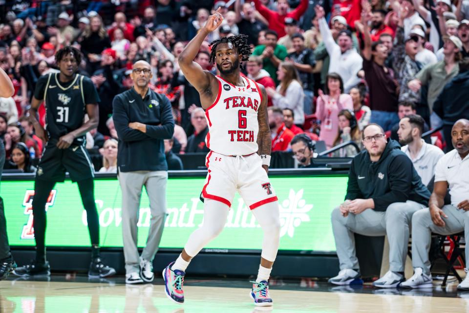 Joe Toussaint of the Texas Tech Red Raiders gestures after making a three-pointer during the first half of the game against the UCF Knights at United Supermarkets Arena on February 10, 2024 in Lubbock, Texas.