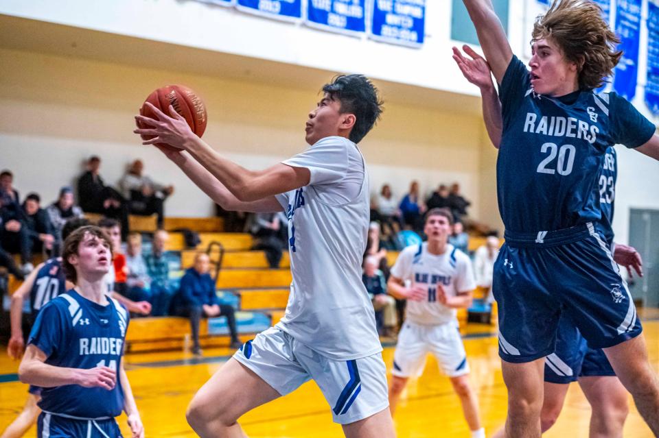 Fairhaven's Hansen Zhao lays it in, and finished with a game high 17 points.