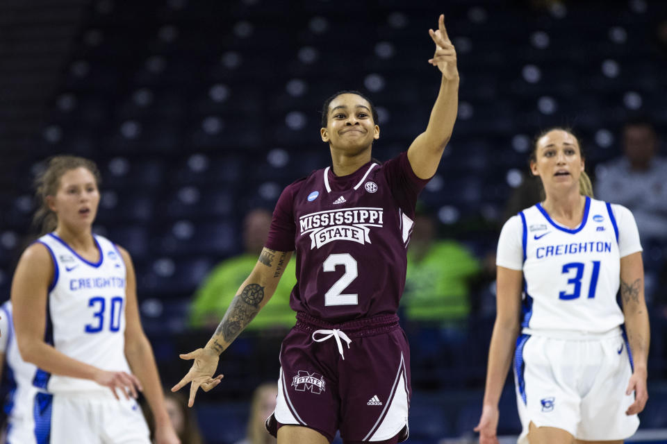 Mississippi State's JerKaila Jordan (2) celebrates after a 3-point basket as Creighton's Morgan Maly (30) and Emma Ronsiek (31) look on during the first half of a first-round college basketball game in the NCAA Tournament, Friday, March 17, 2023, in South Bend, Ind. (AP Photo/Michael Caterina)