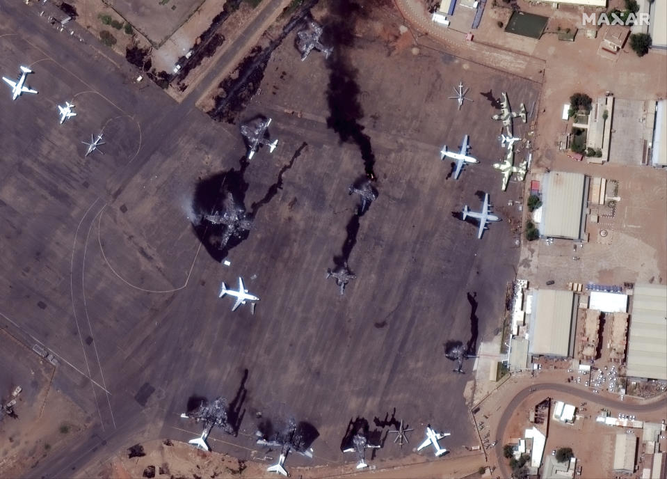 This satellite image provided by Maxar Technologies shows destroyed airplanes in Khartoum International Airport, Sudan, Monday April 17, 2023. The Sudanese military and a powerful paramilitary group are battling for control of the chaos-stricken nation for a third day. (Satellite image ©2023 Maxar Technologies via AP)