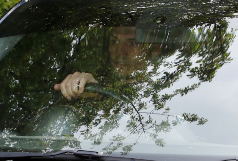 Arsenal players arrive for training