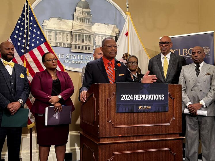 Assemblymember Reggie Jones-Sawyer, D-Los Angeles, speaks about a package of reparations legislation at a press conference at the state Capitol on Wednesday, Feb. 21, 2024. (AP Photo/Sophie Austin)