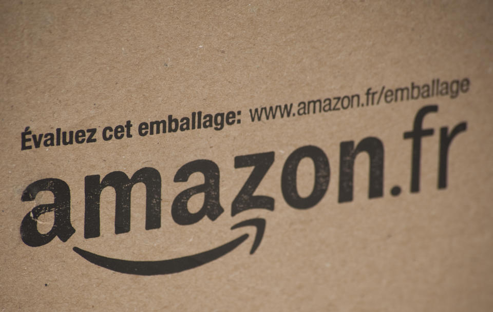 Alston, UK - March 25, 2011: A cardboard packaging box with the printed logo of Amazon.fr, the online retail company.