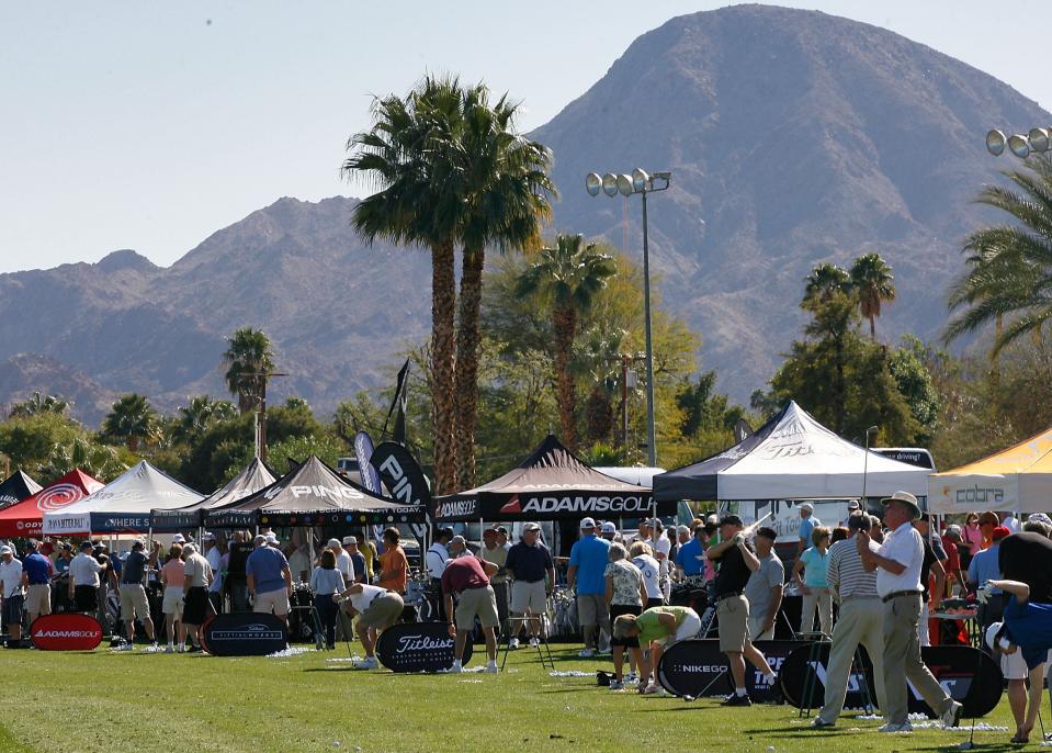 Golfers try out a variety of clubs at the manufacturers tents at the Pete Carlson’s Golf Expo at the College Golf Center in Palm Desert.