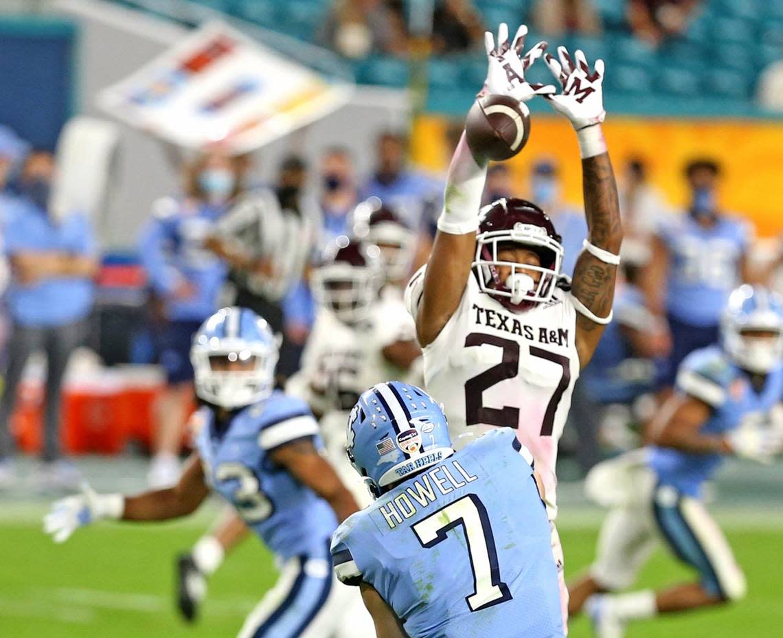 Texas A&M Antonio Johnson (27) blocks North Carolina Tar Heels quarterback Sam Howell pass in the fourth quarter in the Capital One 2021 Orange Bowl at Hard Rock Stadium in Miami Gardens, Florida, Saturday, January 2, 2021. Charles Trainor Jr/ctrainor@miamiherald.com