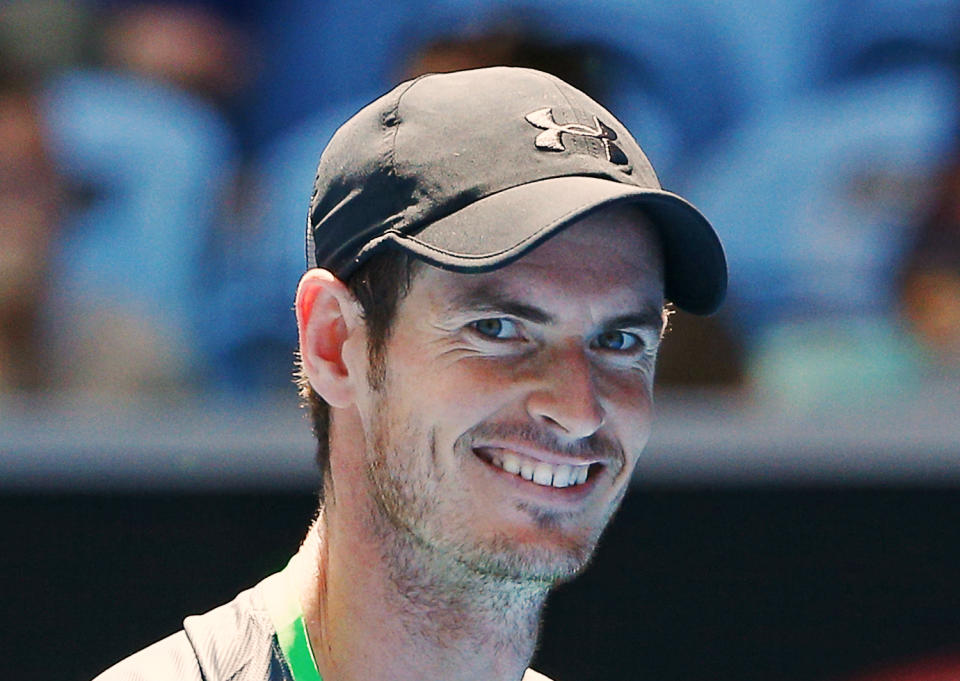 Andy Murray of Britain smiles during his men's singles first round match against Yuki Bhambri of India at the Australian Open 2015 tennis tournament in Melbourne January 19, 2015. Murray beat Bhambri in the match. REUTERS/Athit Perawongmetha (AUSTRALIA - Tags: SPORT TENNIS PROFILE TPX IMAGES OF THE DAY)