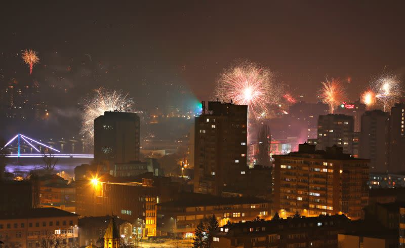 Fireworks explode over the central Bosnian town of Zenica during New Year's day celebrations