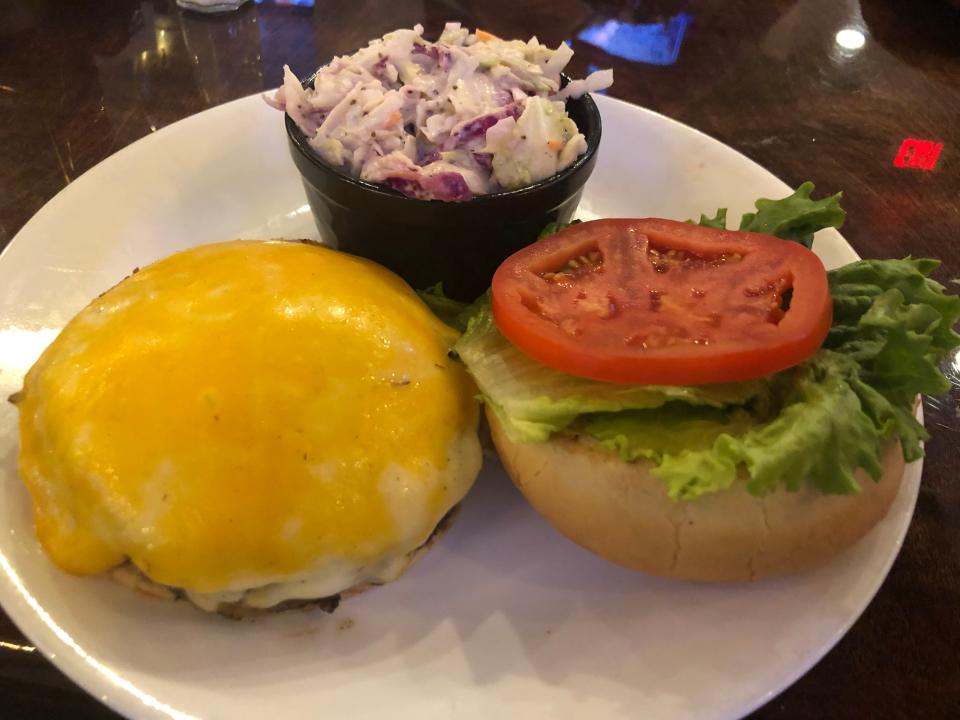 The menu at Tail Gators Brews flaunts its ground beef patty as the “Best Burger in St. Lucie County.”