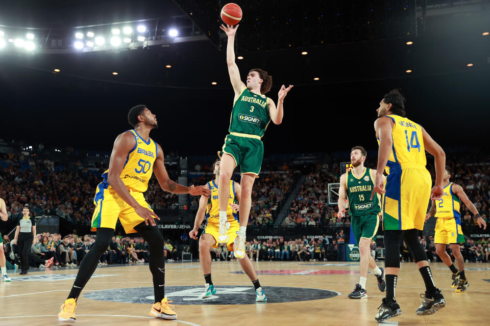 MELBOURNE, AUSTRALIA – AUGUST 16: Josh Giddey of Australia shoots during the match between the Australia Boomers and Brazil at Rod Laver Arena on August 16, 2023 in Melbourne, Australia. (Photo by Kelly Defina/Getty Images)