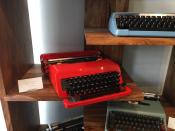 This June 28, 2019 photo shows a display of vintage typewriters for sale at Gramercy Typewriter Co. in New York. All the typewriters for sale are in working condition. Vintage typewriters are sent for repair and restoration daily from around the country, the owner of the store says. (Katherine Roth via AP)