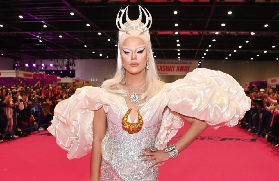 Nicky Doll struck a pose wearing an elegant white crown, as well as a glamourous white gown. The 28-year-old star - whose real name is Karl Sanchez - appeared in Season 12 of 'RuPaul's Drag Race', and is also the host of the show in France.