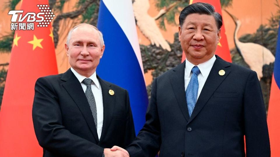 俄羅斯總統普欽（左）親自前往北京，與習近平進行正式會面。（圖／達志影像美聯社）