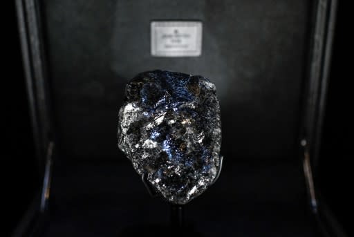 This picture taken on January 21, 2020, shows the world's second- biggest rough diamond named "Sewelo" displayed at Place Vendome's Louis Vuitton luxury shop in Paris