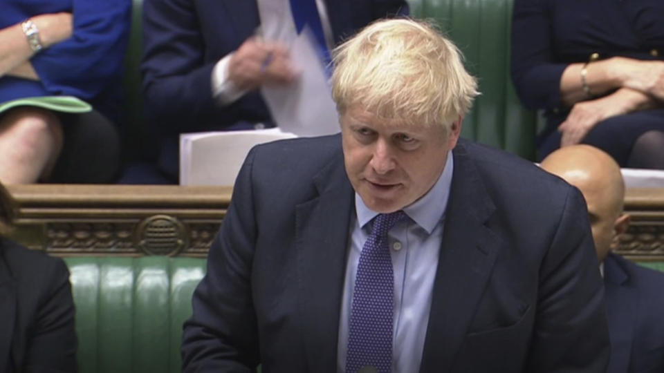 British Prime Minister Boris Johnson speaking in the House of Commons, London during the debate for the European Union Withdrawal Agreement Bill: Second Reading. Tuesday, Oct. 22, 2019. British Prime Minister Boris Johnson's European Union divorce bill faces two votes Tuesday, with lawmakers first being asked to approve it in principle, followed by a vote on the government's schedule for debate and possible amendments. (House of Commons/via AP)