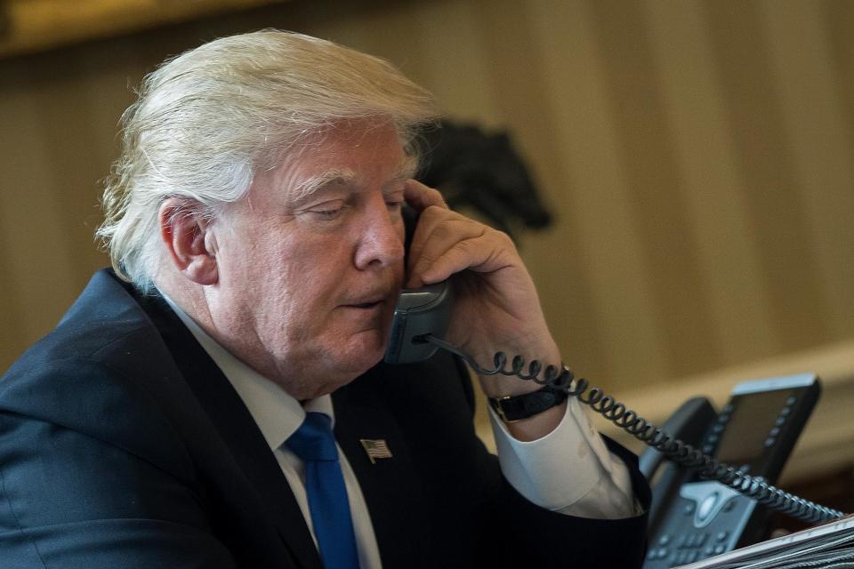 The President speaks to Putin over the phone in January, just days after taking office: Getty Images