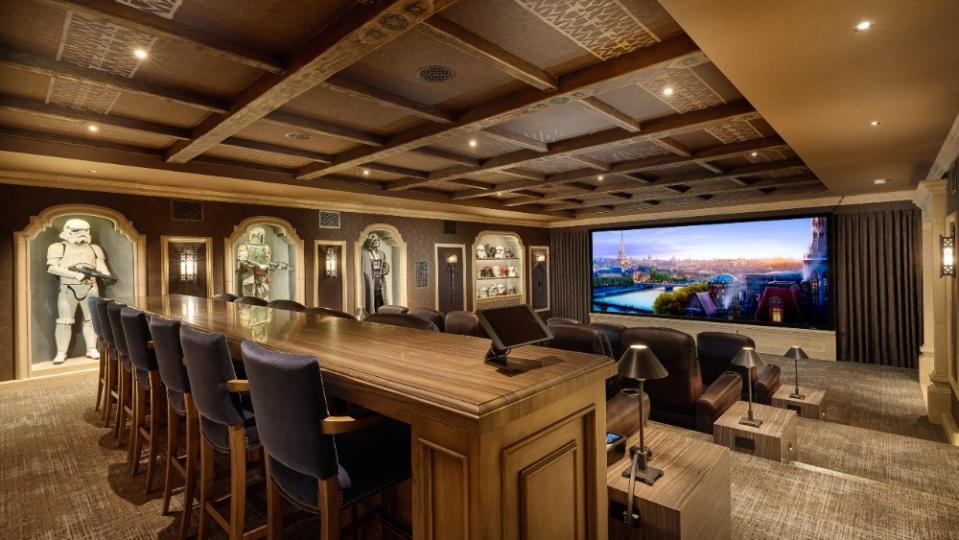 The current owners built a 7,000-square-foot basement that includes a movie theater with seating for 26. - Credit: John Leonffu
