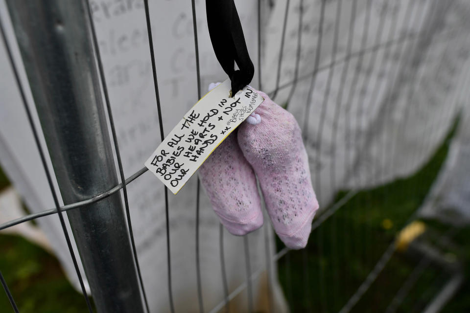 Image: A vigil takes place at the site of the mass grave which contained the remains of 796 named babies from the Bon Secours Mother and Baby home (Charles McQuillan / Getty Images file)