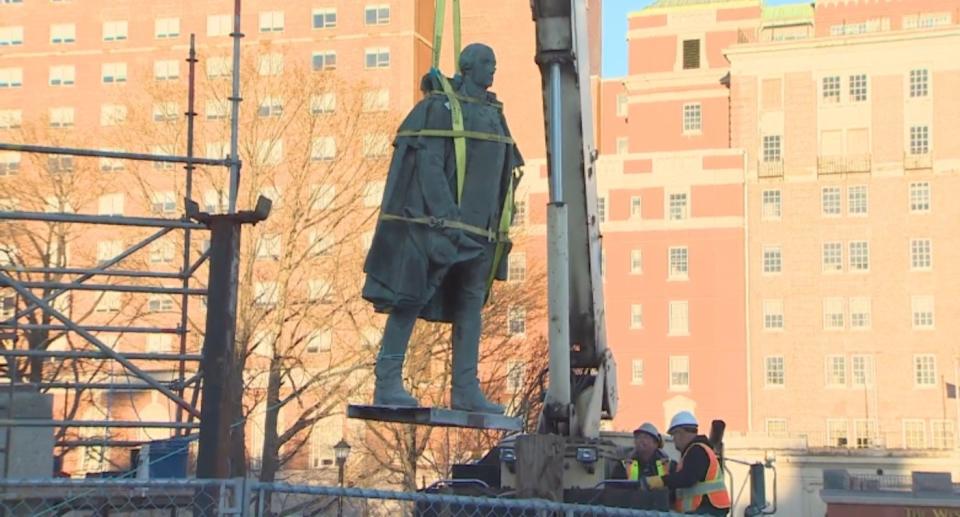 A statue of Edward Cornwallis is seen during its removal from a park also named after Cornwallis in Halifax. (Photo by CBC News)