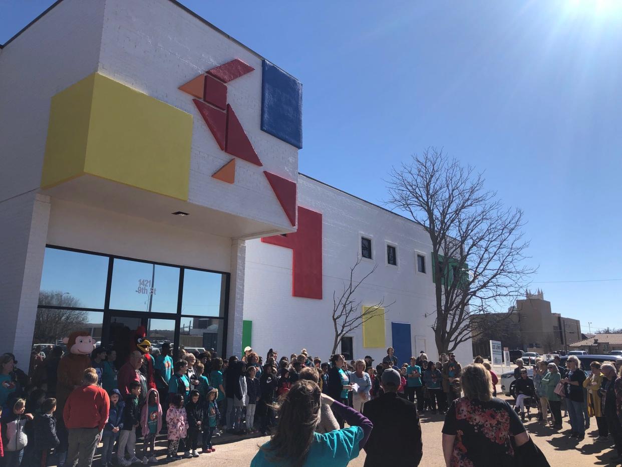 Members of the Lubbock Chamber of Commerce gathered with educators from the  Betty M. Condra School for Education Innovation for a ribbon cutting to help unveil the school's renovations in the former Kaplan College building Friday afternoon at 10th Street and Avenue O.
