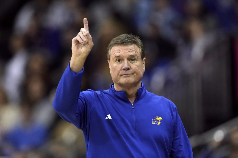 Kansas head coach Bill Self motions to his players during the first half of an NCAA college basketball game against Wichita State Saturday, Dec. 30, 2023, in Kansas City, Mo. (AP Photo/Charlie Riedel)
