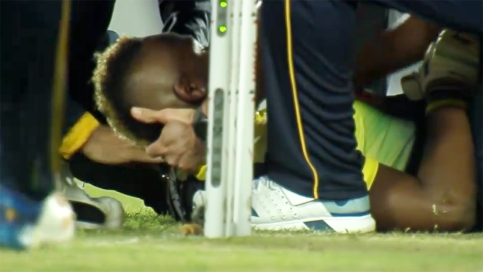 Andre Russell, pictured here after the frightening moment.