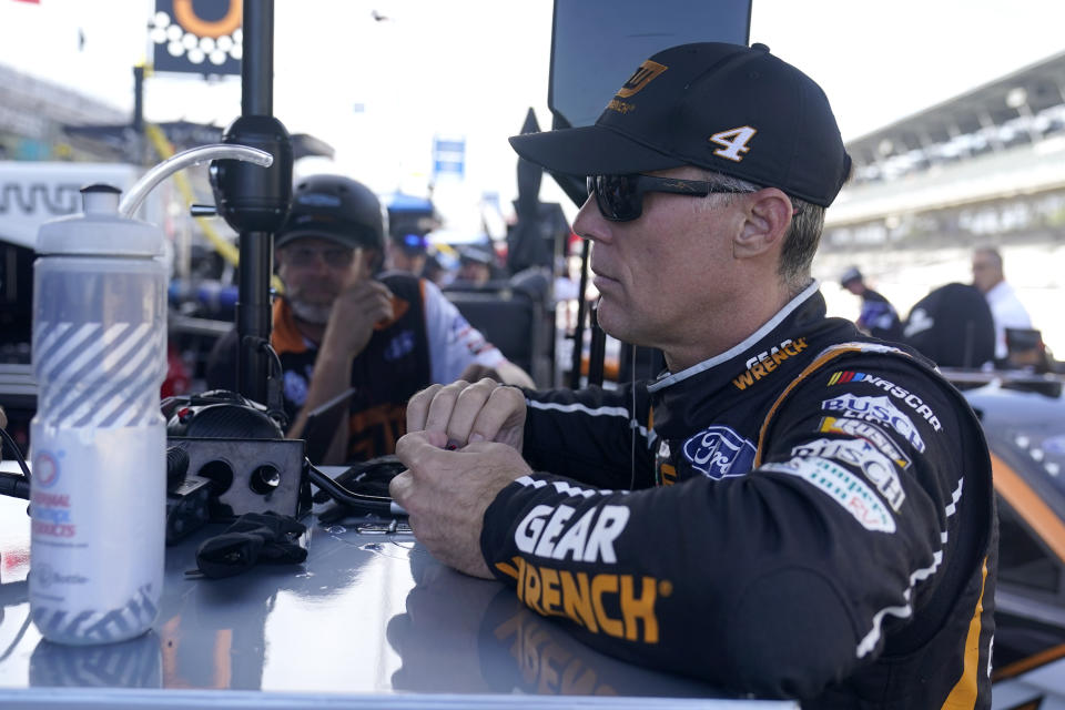 Kevin Harvick waits in the pits before during for the NASCAR Cup Series auto race at Indianapolis Motor Speedway, Saturday, July 30, 2022, in Indianapolis. (AP Photo/Darron Cummings)