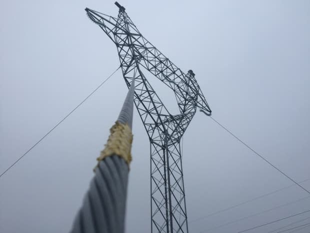 A guy-wired-supported steel transmission tower like this one collapsed June 19, 2017, near Come by Chance, resulting in the death of two linemen.