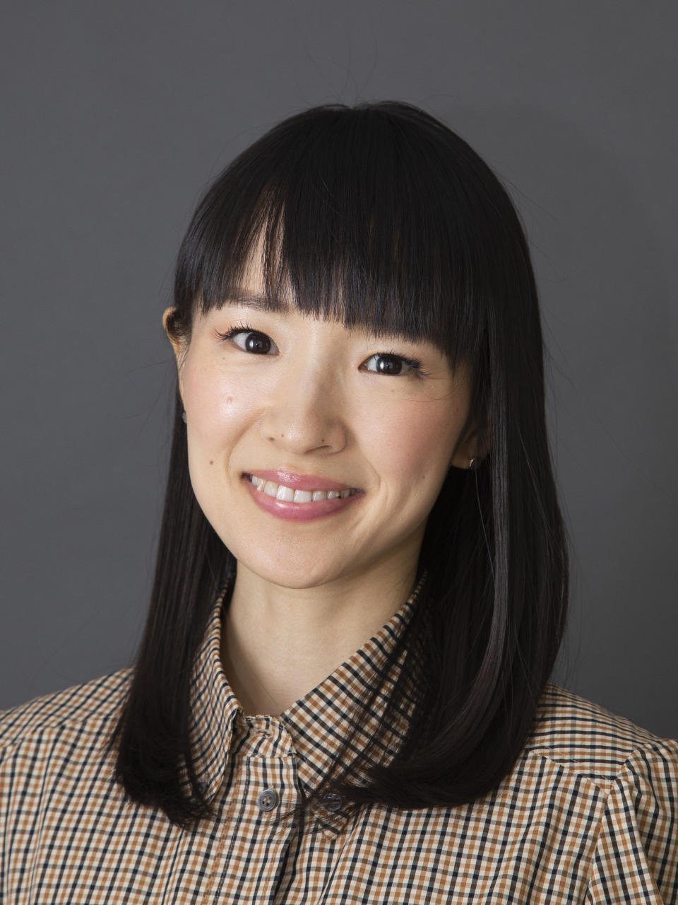 Author and television personality Marie Kondo poses for a portrait to promote her children's book "Kiki & Jax: The Life-Changing Magic of Friendship" on Monday, Nov. 4, 2019, in New York. (Photo by Andy Kropa/Invision/AP)