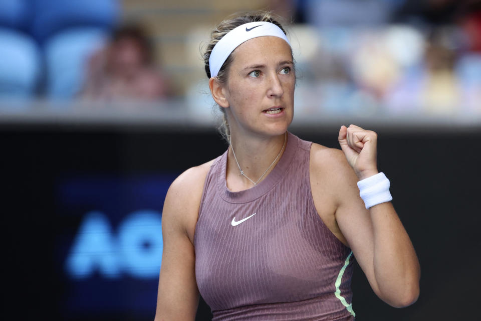 Victoria Azarenka of Belarus reacts after defeating Jelena Ostapenko of Latvia in their third round match at the Australian Open tennis championships at Melbourne Park, Melbourne, Australia, Saturday, Jan. 20, 2024. (AP Photo/Asanka Brendon Ratnayake)