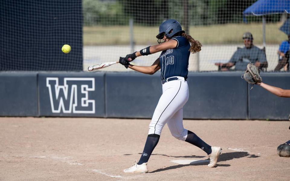 Central Catholic’s Madison Harrison connects on a three-run homer during the Northern California Regional Division III semifinal playoff game with Pleasant Valley at Central Catholic High School in Modesto, Calif., Thursday, June 1, 2023. Central won the game 8-1.